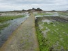 The causeway to Elizabeth Castle at low tide. St Helier, Jersey