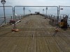 A very sad pier at Teignmouth, Devon UK. Game machines and the pier closed off.