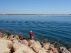 Some people fish on Foz do Guadiana, Vila Real de Santo António PT